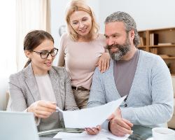 happy mature spouses listening to real estate or i Y7689N3