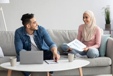young arab couple looking for health insurance on 58WGBH5